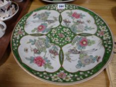 A Chinese Famille Vert charger