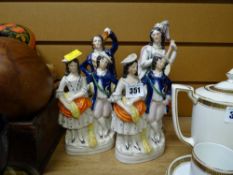 Four Staffordshire flat back figures