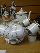 A Minton demitasse coffee set in the Greek key pattern together with small parcel of Spode gold