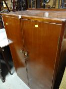 A vintage compact wardrobe