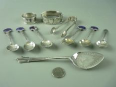 A SMALL PARCEL OF FIVE SILVER SPOONS - sugar tongs, jam spoon, napkin ring and a half bright cut