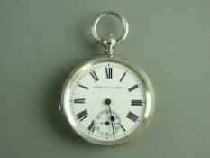 A GENT'S SILVER ENCASED KEYWIND POCKET WATCH having Roman numerals, sweep seconds dial and bearing