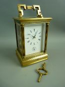 A QUALITY SWISS BRASS CASED CARRIAGE CLOCK for Matthew Norman Retailers, London, the classically
