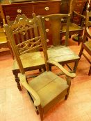 AN EARLY 19th CENTURY LAMBING ARMCHAIR and two country oak farmhouse chairs, the highback lambing