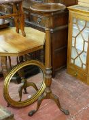 A REPRODUCTION MAHOGANY TORCHERE STAND and a classically styled gilt framed wall mirror