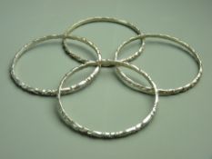 Lots 202-252 all consigned by one local private vendor FOUR SILVER SCROLL PATTERN NEPALESE