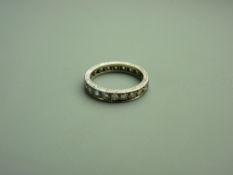 AN EIGHTEEN CARAT WHITE GOLD DIAMOND SET FULL ETERNITY RING, approximately twenty two Swiss cut