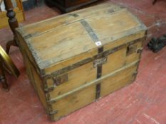 AN ANTIQUE PINE DOME TOPPED CAPTAIN'S CHEST with iron strapping and locks, 56 cms high, 75 cms wide