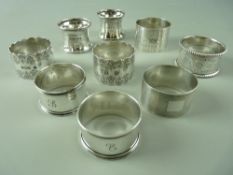 THREE PAIRS OF SILVER NAPKIN RINGS and three odd silver napkin rings, total weight 7 troy ozs