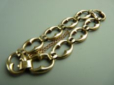 A LADY'S NINE CARAT GOLD FANCY LINK BRACELET, fully marked, makers J C & S, 14.2 grms gross