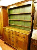 A 19th CENTURY ANGLESEY OAK DRESSER, the three shelf shape sided rack with wide green painted