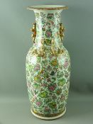 A LARGE CHINESE 19th CENTURY CANTONESE VASE having Famille Rose/Verte abundant decoration of