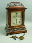 A WINTERHALDER & HOFMEIER EIGHT DAY MANTEL CLOCK, the caddy top architectural case with ribbon