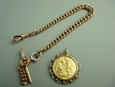 A GEORGE V 1915 GOLD SOVEREIGN with gold Albert, the sovereign mounted in a nine carat gold marked