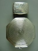 A GEORGE IV VINAIGRETTE and an Art Deco powder compact, the vinaigrette with engraved leaf