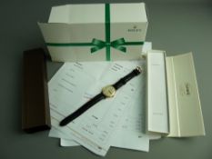A GENT'S CIRCULAR DIAL 9ct GOLD ROLEX WRISTWATCH with sweeps seconds dial, Champagne Arabic 3,6,