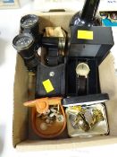 A parcel of various collectables including opera glasses, wrist watches, cuff links, short studs