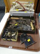 A small parcel of vintage tools, picture rail hooks, small aluminium toolbox, vintage foot pump etc