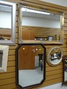 A modern gilt framed bevelled wall mirror together with an octagonal mahogany & gilt mirror