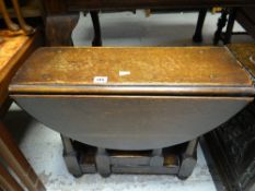A small oak drop-leaf gate-leg side-table