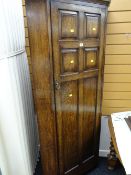 A nice oak corner standing hall cupboard with interior mirror & hanging rail