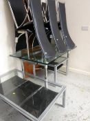 Glass topped chrome & steel extending dining table with six chrome & black leather effect high