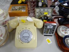 Three vintage mantel clocks together with a two-piece ivory telephone
