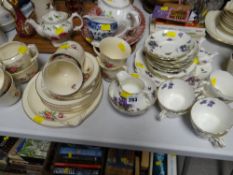 A Hamersley & Co tea set decorated with blue flowers together with a vintage Royal Tudorware