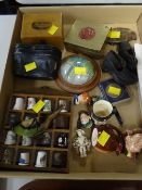 A collection of items including vintage wind up bird, miniature Toby Jugs, miniature clogs, thimbles