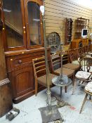 Two vintage brass effect standard lamps, one with a lower shelf