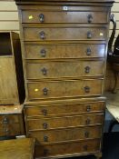 A reproduction flame mahogany chest-on-chest