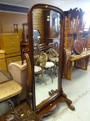 A reproduction mahogany cheval mirror