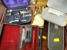 Selection of various vintage cased medical instruments
