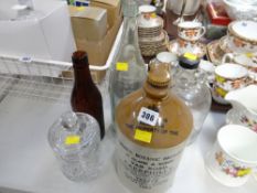 A vintage stoneware bottle for Crown Botanic Brewery, Van Road, Caerphilly together with an Ely