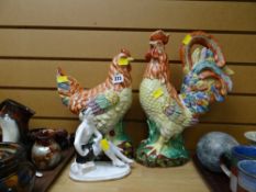 A large ceramic chicken & cockerel together with a Deco-style seated figure
