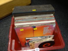A collection of various LP & single records including U2, Queen, Fleetwood Mac etc