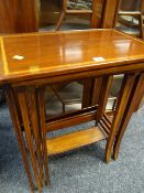 A nest of four mahogany tables with banding & inlay