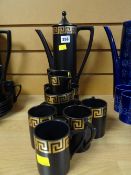 A Portmeirion black & gold Greek Key coffee set