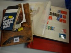 Three vintage stamp albums & a small collection postcards from the early twentieth century