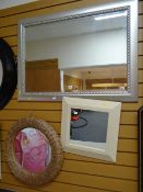 Large silver framed bevelled wall mirror together with a circular wicker framed & another