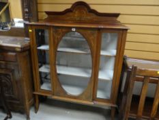 Vintage mahogany display cabinet on raised feet with large oval glass central door together with a