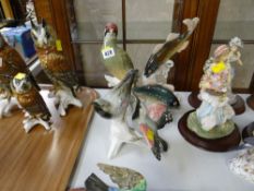 Three large continental figure groups, salmon leaping, hummingbirds & woodpecker