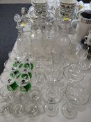 Various decanters & drinking glasses
