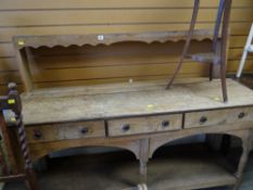 A stripped wood open dresser