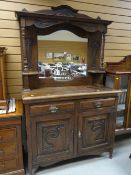 A vintage oak Art Deco-style mirror back dresser