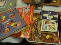 A selection of loose cigarette cards together with two hardback children's books