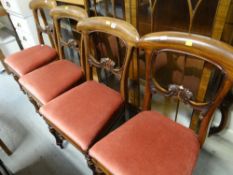 Set of four matching carved backed and cushioned dining chairs