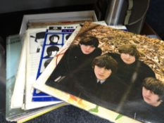 Selection of Beatles LP vinyl records including a rare promo album of The Beatles recorded in