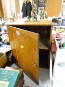 A vintage small oak brass carry handle locking wall box