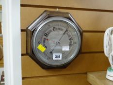 An octagonal oak barometer